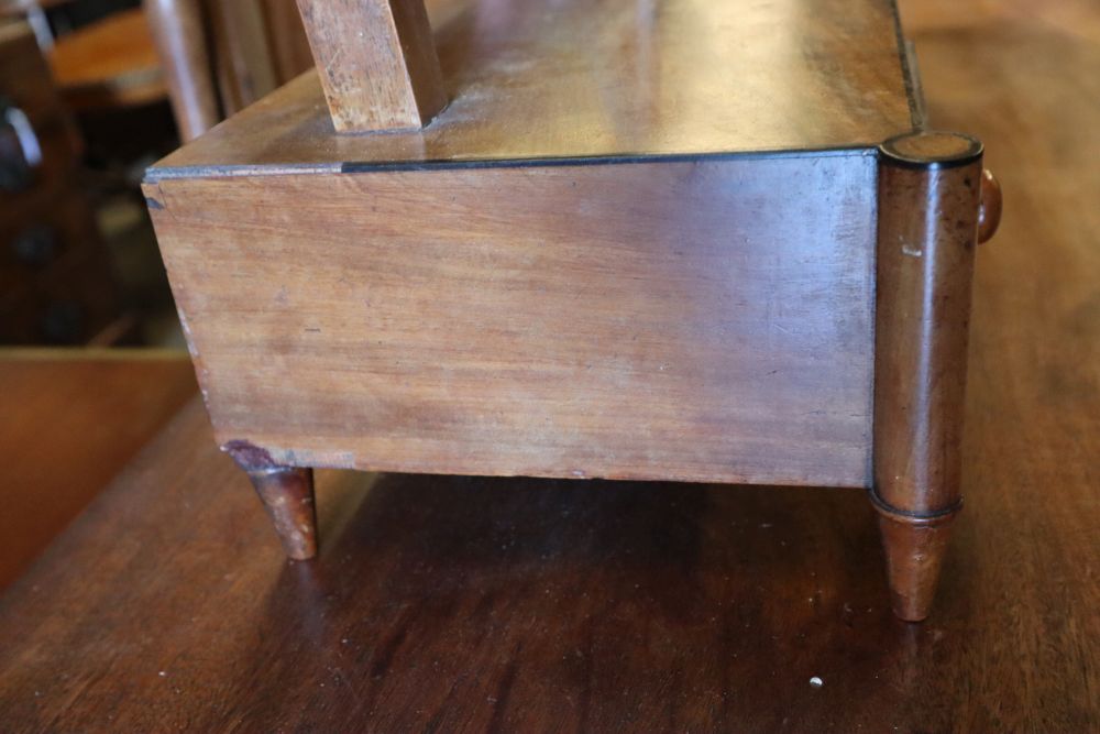 A Regency mahogany five drawer bowfront chest, width 91cm and a mahogany toilet mirror, width 67cm